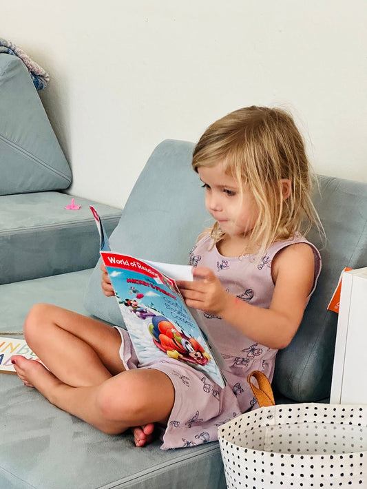 a little girl reading